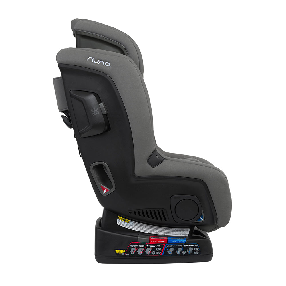 Grey Nuna car seat side view with armrest, harness guide, and base controls