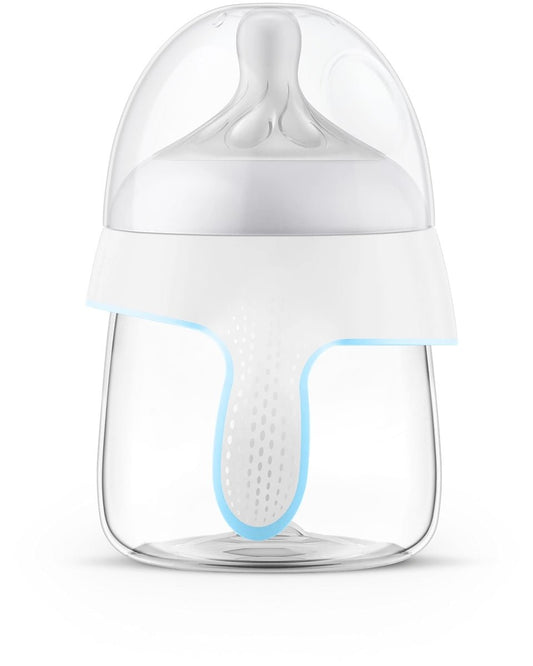 Trainer cup with clear body, white lid, blue rim and soft vented nipple