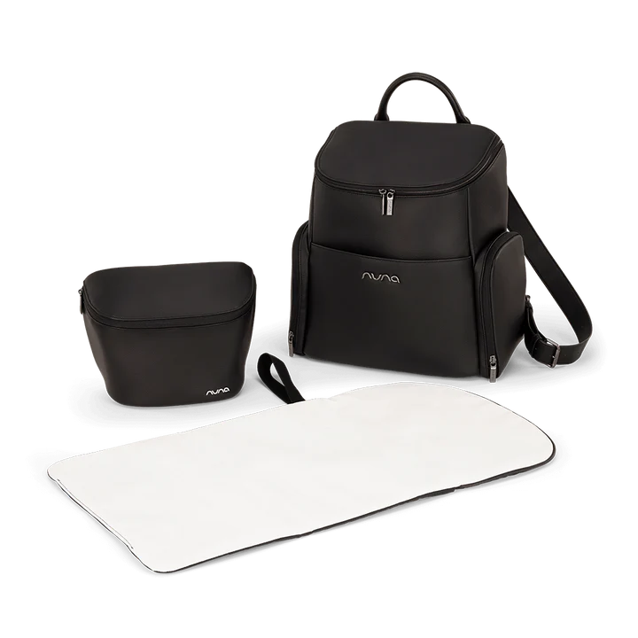 Black caviar-style backpack with matching small pouch and white mat