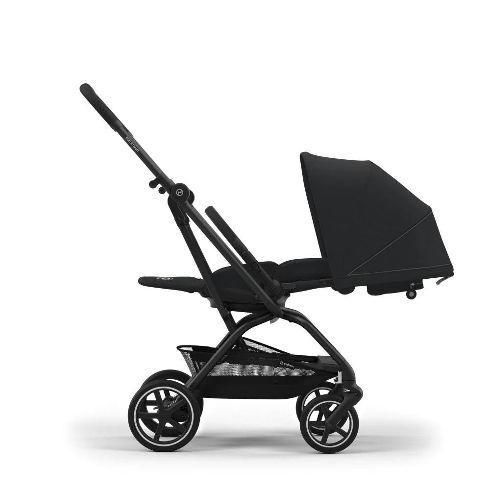 Black stroller with extended canopy and reclining seat, side view