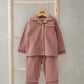 Red and white check jersey pyjama set, button-front top and matching trousers