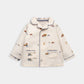 Transport print pyjama jacket, cream: zip front with chest pockets and contrast cuffs