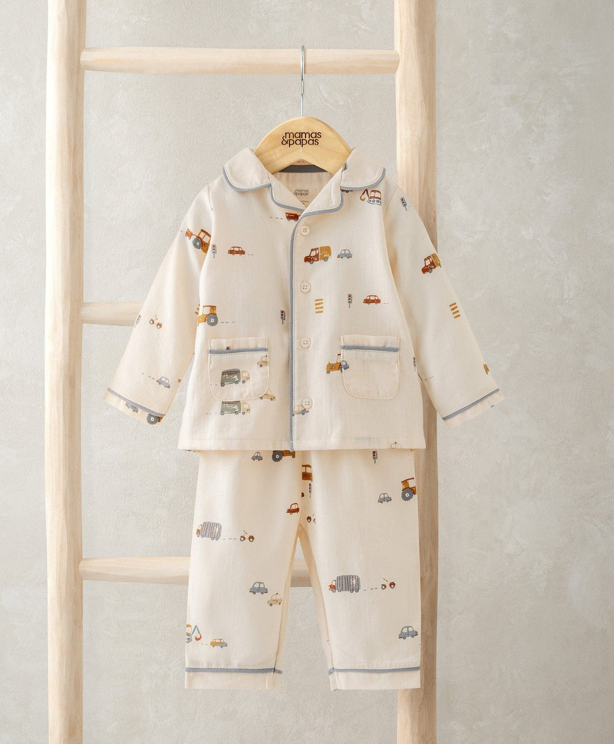 Transport print pyjama set: zip-front jacket and matching pants, cream