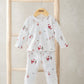Kids’ long-sleeve pajama top and pants, white with red Christmas characters