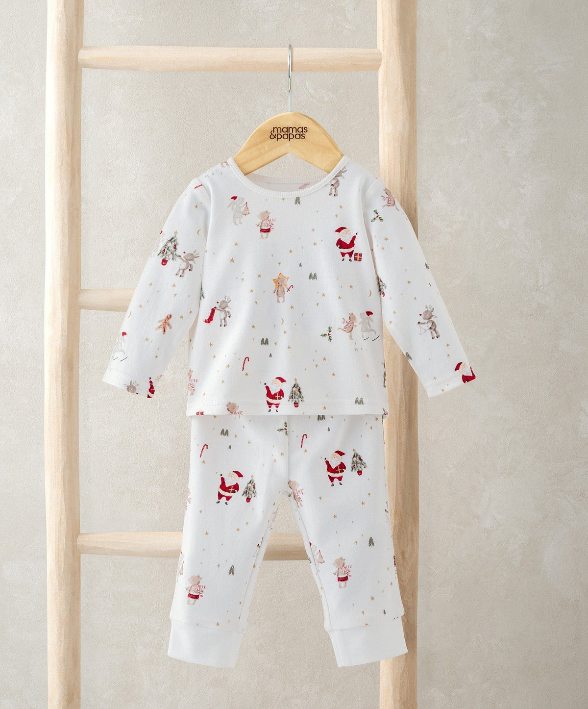 Kids’ long-sleeve pajama top and pants, white with red Christmas characters