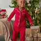 Red Christmas pyjama set with white piping, button-up top and cuffed pants
