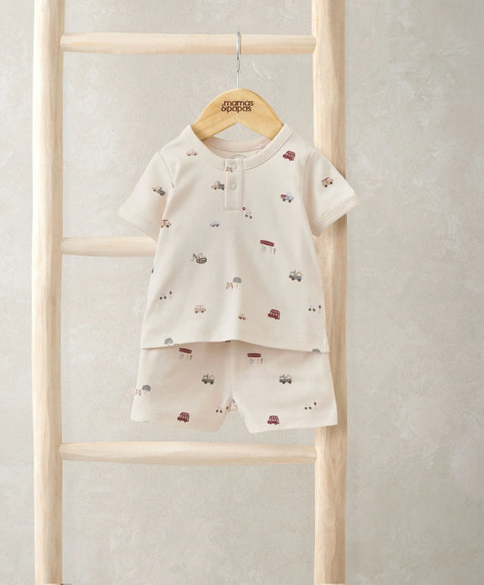 Cream short pyjama set with button-front top and elastic-waist shorts, allover explorer prints
