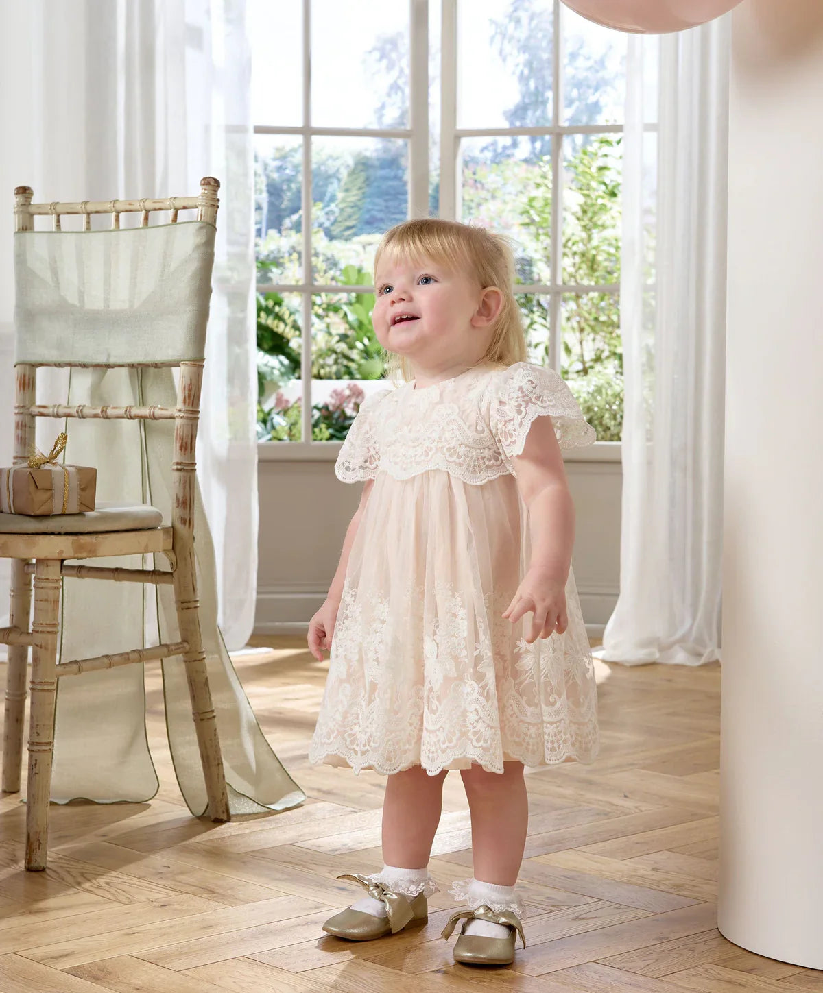 White lace frill sleeve dress with gathered bodice and flared layered skirt