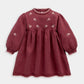 Maroon floral embroidered dress with long puff sleeves and gathered waist