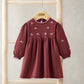Maroon floral embroidered baby dress with long sleeves and gathered skirt