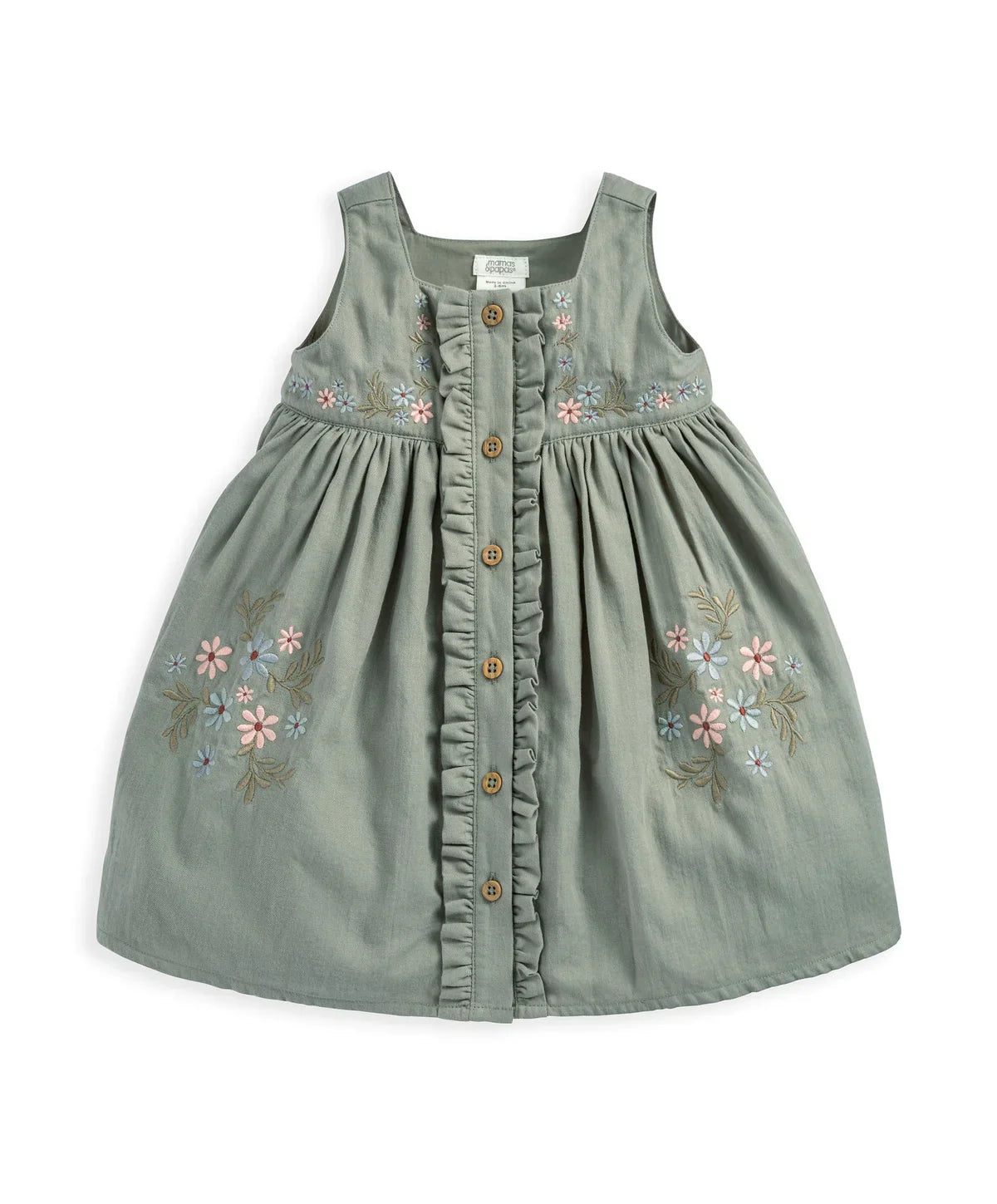 Sage green floral pinafore with gathered skirt, ruffle trim, and wooden button placket.
