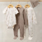 Baby bodysuit set: white bear-print long-sleeve onesie, brown ribbed onesie, knit hat