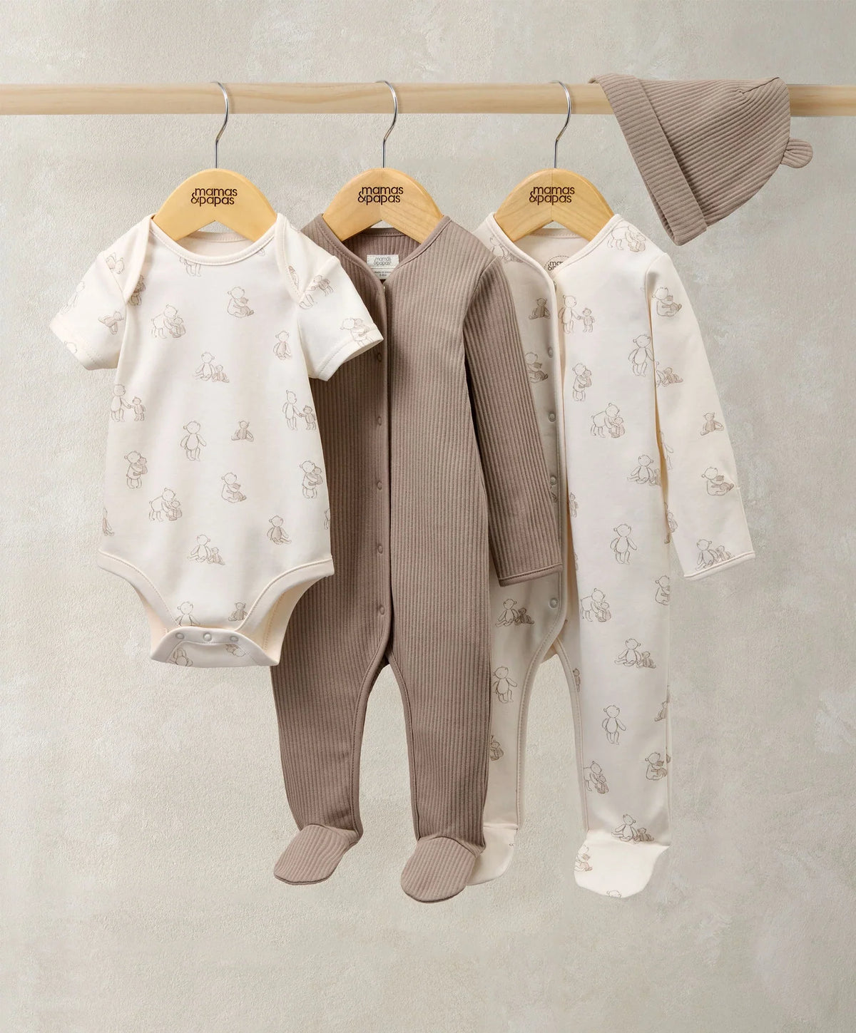 Baby bodysuit set: white bear-print long-sleeve onesie, brown ribbed onesie, knit hat