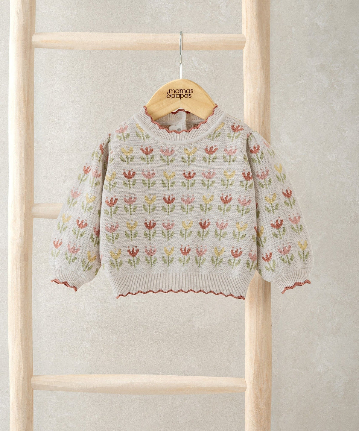 Floral knitted jumper with tulip print, cream knit, scalloped collar and red trim