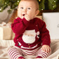 Red Christmas jumper on baby with Santa knit motif, ribbed collar and cuffs