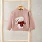 Light pink knit Christmas jumper with bunny appliqué and red bow at center, long sleeves
