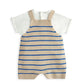Knitted dungarees romper with blue stripes and beige straps over short-sleeve white T-shirt