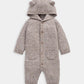 Grey ribbed knit hooded romper with button front, pockets, and face embroidery