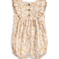 Cream ditsy floral shortie romper with ruffled shoulders and front buttons