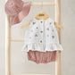 Peach bucket hat, white swing top with cherry print and gold buttons, pink bloomers