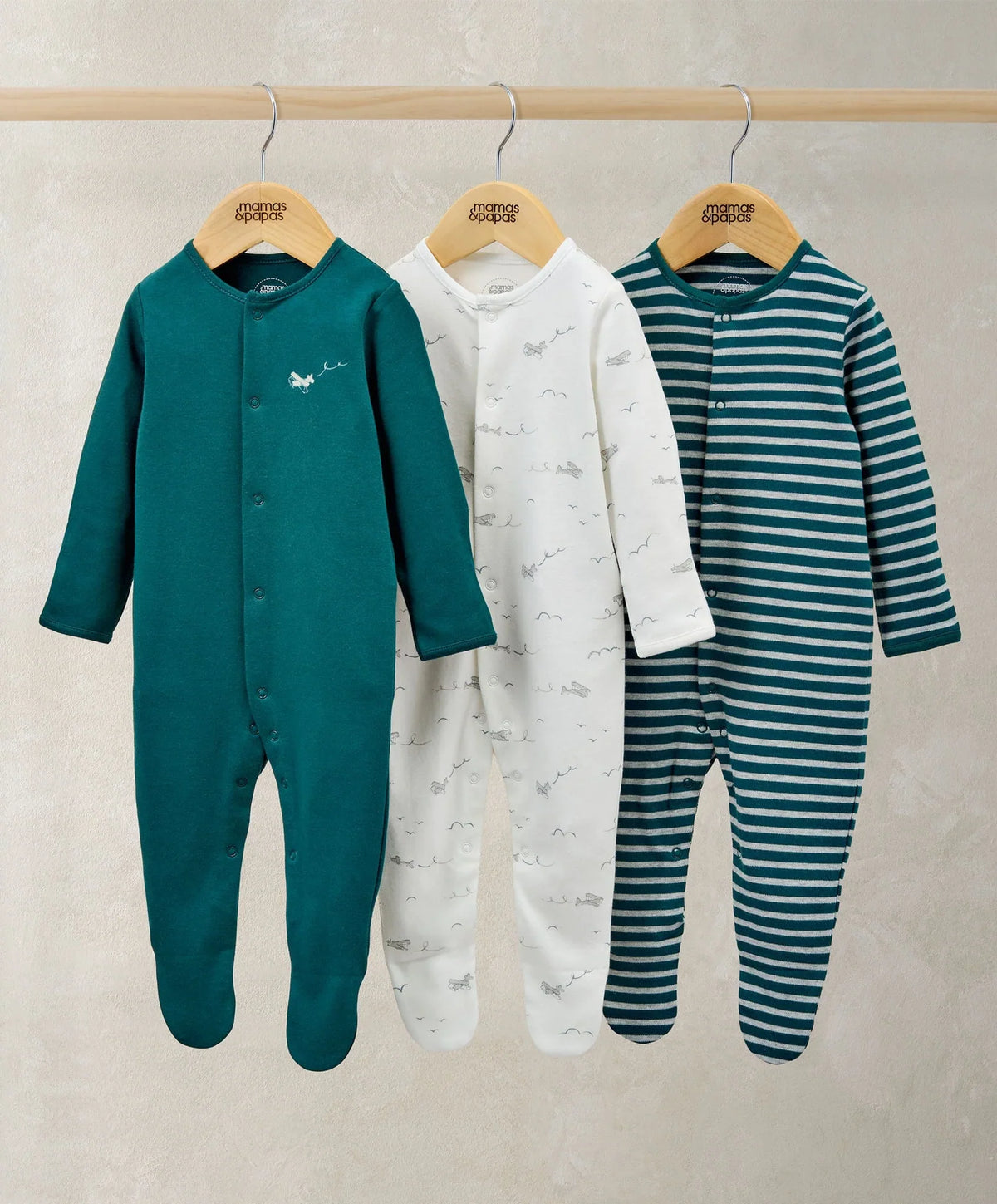 3-piece sleepsuit set: teal solid, white plane print, teal striped onesies
