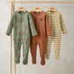 Woodland animal sleepsuit set: green printed, brown plain, yellow striped footed onesies