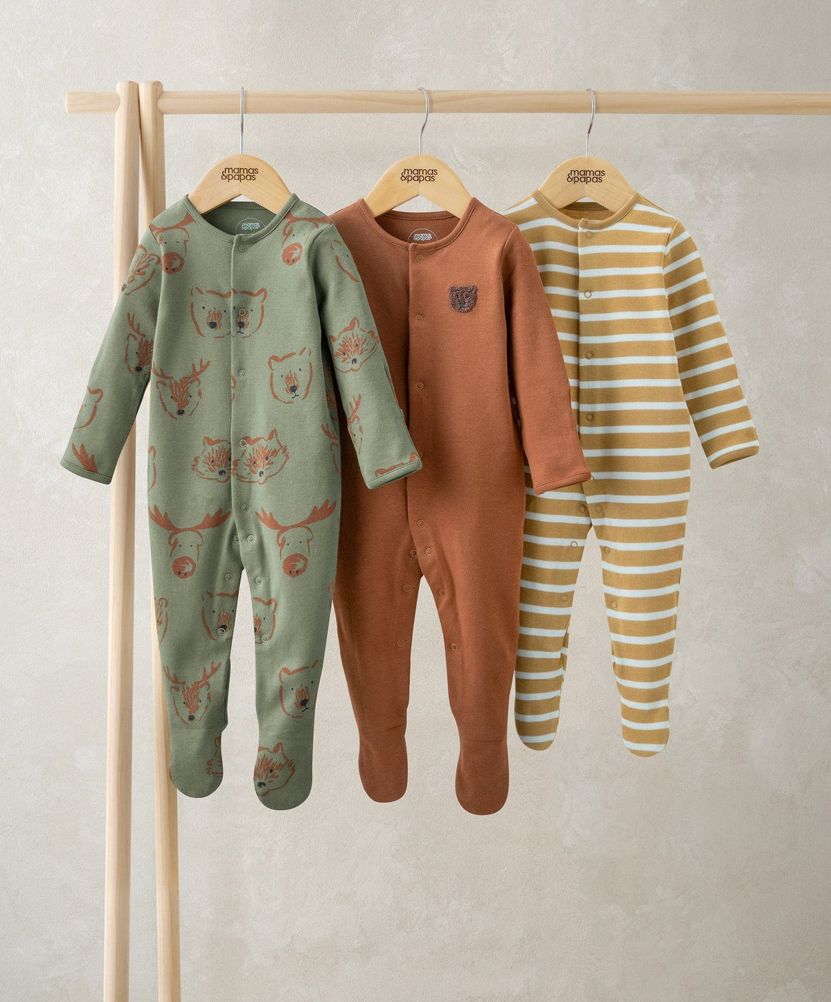 Woodland animal sleepsuit set: green printed, brown plain, yellow striped footed onesies