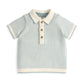 Light blue knitted polo shirt with cream ribbed collar and button placket