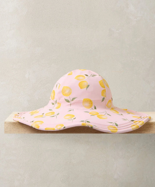Lemon print floppy sunhat, light pink with yellow fruit pattern and wide brim