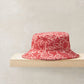 Red bucket hat with white nautical pattern, wide brim