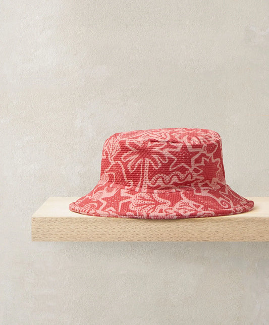 Red bucket hat with white nautical pattern, wide brim
