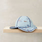 Squid print swim cap, light blue with navy brim and side flap, orange and gray squid