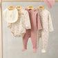 5-piece baby clothes set: floral footed pajamas, ribbed mauve pants, pink hat, bib