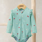 Mint green strawberry-print long-sleeve one-piece swimsuit with ruffled shoulders