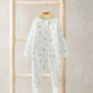 White safari-print footed all-in-one with zip front, long sleeves, on hanger