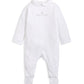 White embroidered baby romper, long sleeves, embroidered chest text, footed legs