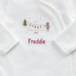 Velour all-in-one with white chest print: First Christmas 2025 and name Freddie