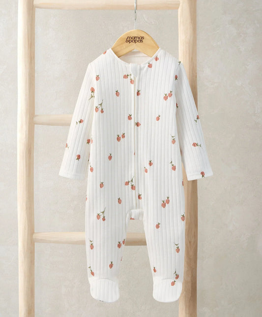 White ribbed zip-front sleepsuit with strawberry print, long sleeves and feet