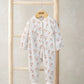 Daisy-print sleepsuit with long sleeves and footed legs, white with pastel flowers