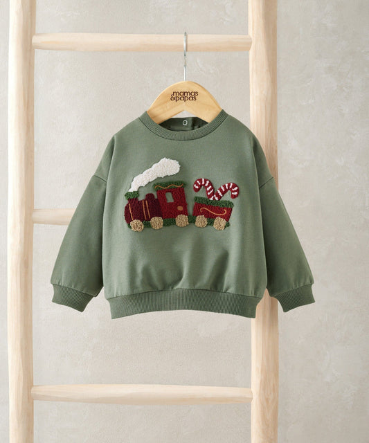 Green Christmas train jumper, full front view, crew neck and appliqué train graphic