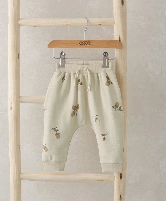 Cream acorn print joggers with elastic waistband and drawstring