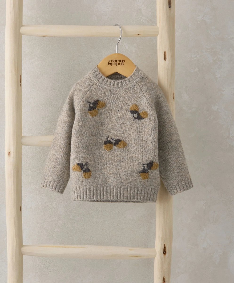 Grey knit jumper with acorn pattern, crew neck, ribbed cuffs and hem