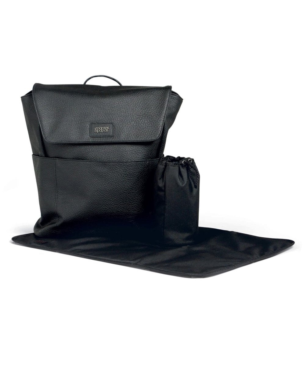 Black adjustable changing backpack with top flap and included changing mat