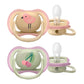 Double pacifier set with bird and fruit-style prints, pink and beige ring frames