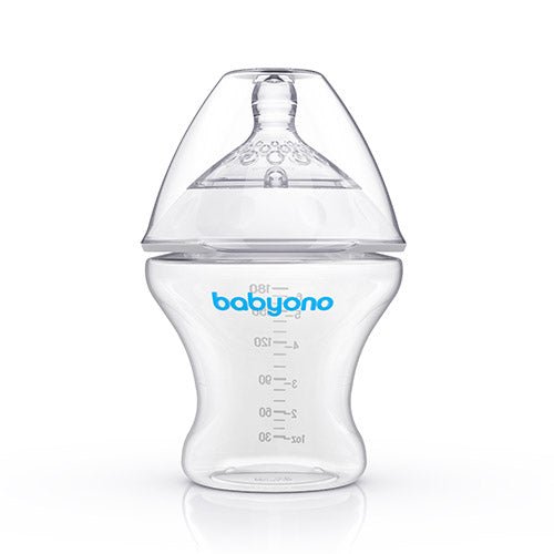 Anti-colic baby bottle in clear plastic with wide collar and measurement markings