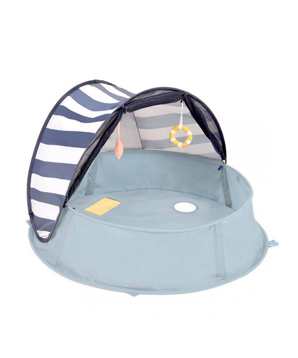 Light blue pop-up baby play tent with mesh sides and navy-and-white striped canopy