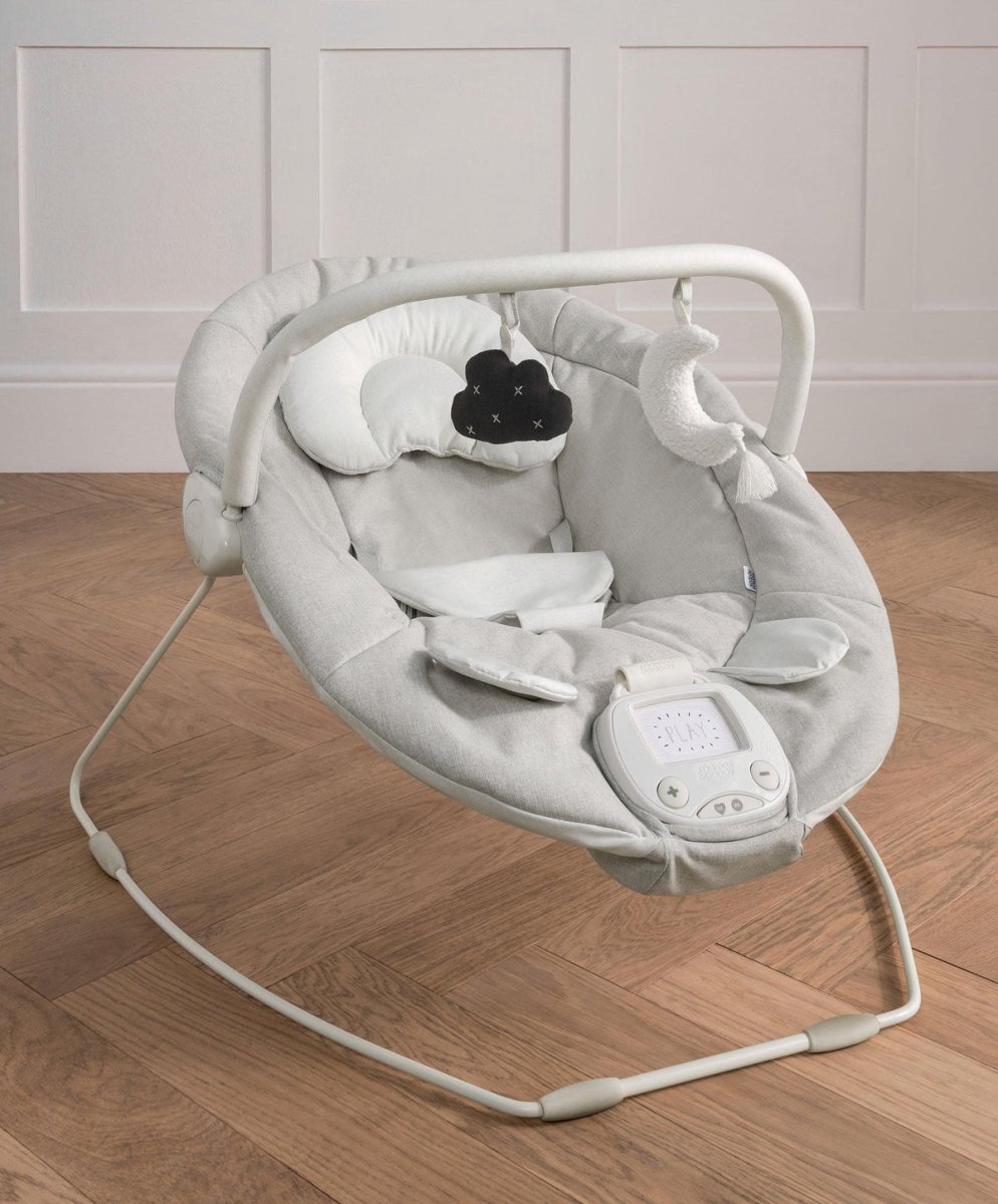 Baby swing bouncer with light gray padded seat, arch frame, and hanging cloud toy