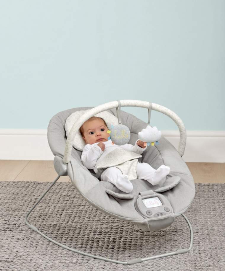 Pebble grey baby bouncer cradle with curved frame, toy arch, and seated baby