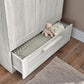Nursery wardrobe storage drawer open with quilted liner, light nimbus white cabinet