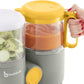 Baby food processor with clear blending jars, gray base, and yellow lid being held